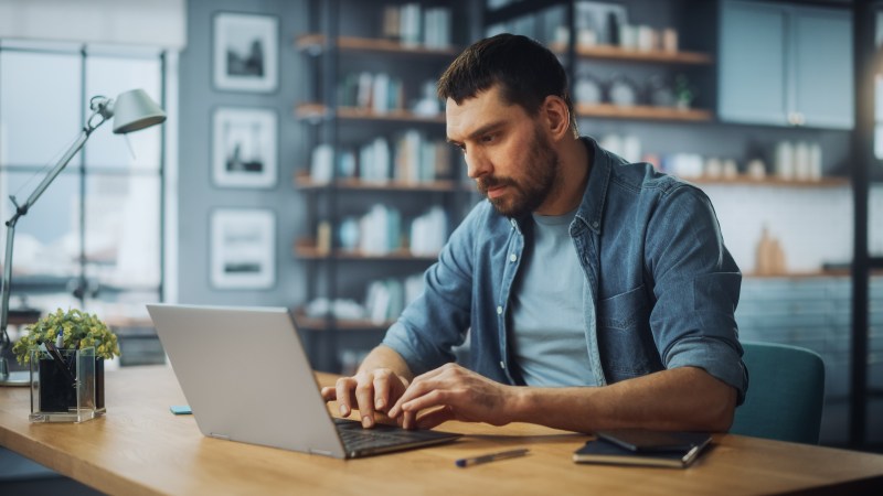 Man working on a laptop computer